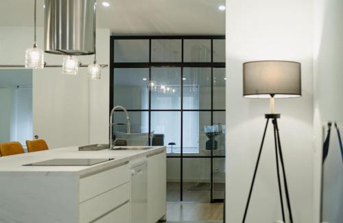 Lugo Apartment | Ático Isabel, diseño y calidez junto a la Muralla Romana