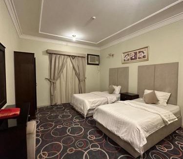 Abha Hotel | اجنحة ارتياد للشقق المخدومه