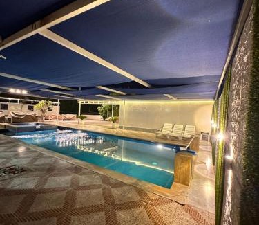 Falaj al Moalla House | استراحة الخيالة