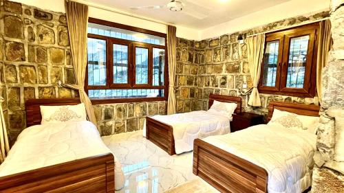 Wadi Bani Kharus Hotel | بيوت الضيافه