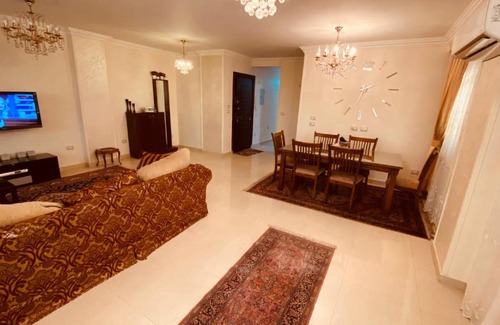 6th of October City Apartment | شقه مفروشه فاخره بكمبوند فيلات حدائق الفردوس امام دريم لاند Luxurious well furnished apartment in Alfardos villas compound over looking a nice garden in front of Dreamland