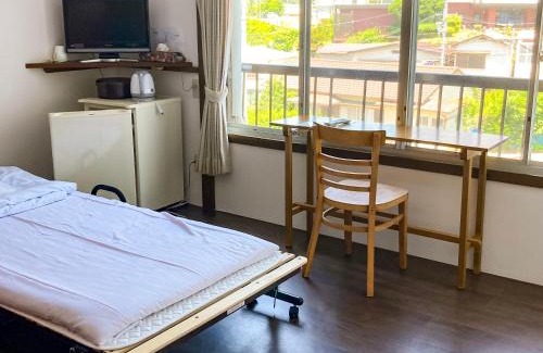 Tsubaki Onsen Hotel | おんせん民宿望海