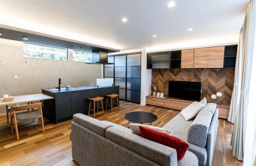 Nishi Ward Apartment | みらいステイKAWACHI サウナspaや温泉付き-絶景オーシャンビューを満喫