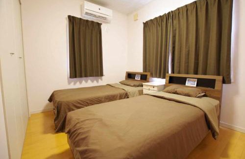 Amami Apartment | ゲストハウス凪人