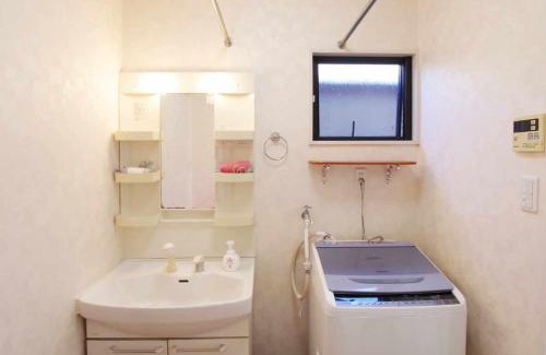 Amami Apartment | ゲストハウス凪人