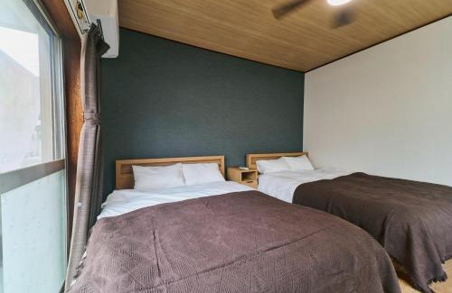 Inuyama Apartment | 犬山口駅10分 80インチ映画館有 無料駐車場 ベッド6台 ソファベッド1台 83平米 最大10名宿泊可