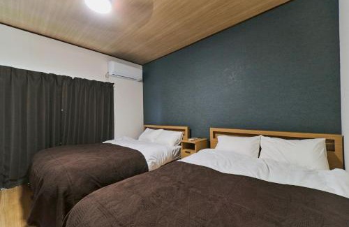 Inuyama Apartment | 犬山口駅10分 80インチ映画館有 無料駐車場 ベッド6台 ソファベッド1台 83平米 最大10名宿泊可