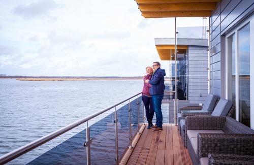 Kroeslin House | 09. floating houses (140 m²) Wotan - Floating house no. 12 Wotan with fireplace and