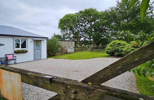 Saint Ann's Chapel Cabin | 1 Bed Cabin-Sleeps 2, Hot Tub, Garden, Views, Pets