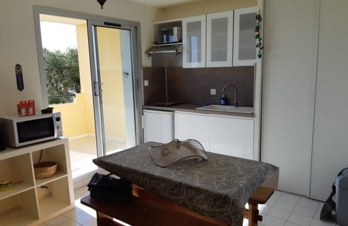 Saint-Pierre-la-Mer Apartment | 1-bedroom studio with sea view. Ideal for 2 adults and 1 child.