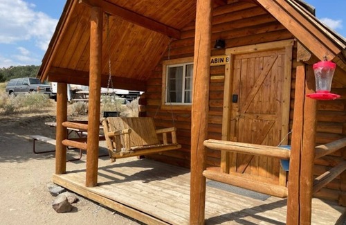 Buena Vista Cabin | 1 Room Dry Camping Cabin. Sleeps up to 4 in one queen bed and a set of twin bunks.