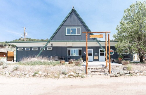 Buena Vista Cabin | 1 Room Dry Camping Cabin. Sleeps up to 4 in one queen bed and a set of twin bunks.