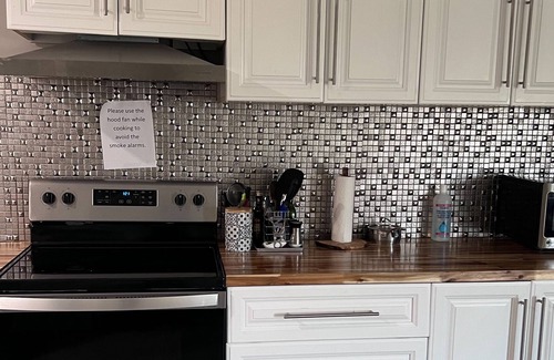 Calgary Apartment | 10 mins from airport, walkout basement apt.