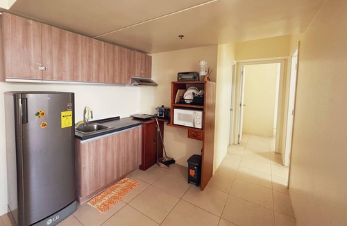 San Jose Condo | 10F Tagaytay 2BR HUGE Balcony w/TAAL View Netflix