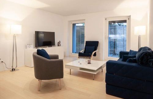 Sankt Alban Apartment | 2,5 Zi Design Loft Wohnung mit Gartensitzplatz