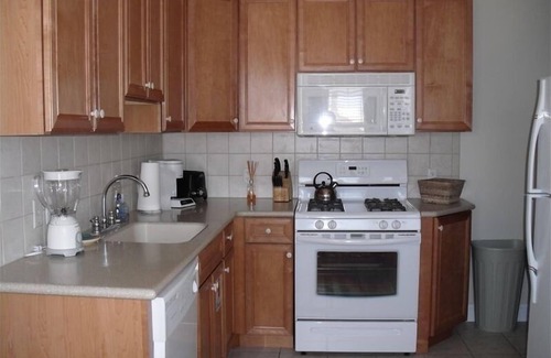 Wildwood Crest Condo | 2-Bd Condo, Pool and Views of Sunset Lake. Watch the fireworks from the porch!