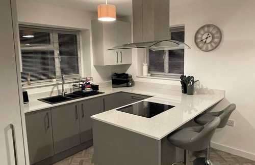 Leicester House | 2-bedroom bungalow offers a perfect blend of comfort and convenience.