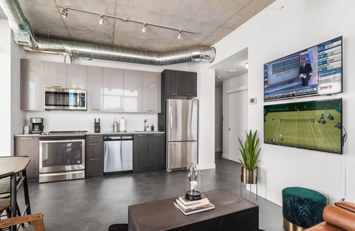 Bridgeland Condo | 2 Bedroom Downtown Executive Suite with Endless River View | Rooftop Patio
