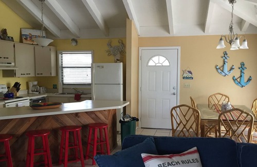 Palm Island Cottage | 2 bedrooms, 2 bath Cottages, Palm Island, Beach Access, Heated Pool, Boat Dock