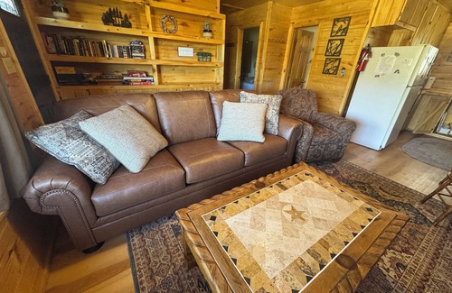 Greer Cabin | 2 BR-1BA Log Cabin on Main Street. Stocked trout pond, fireplace, porch, Dogs Ok