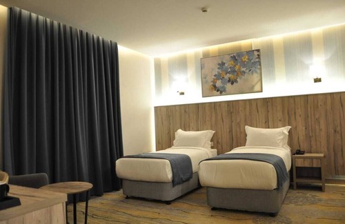 Mecca Apartment | 2 Hotel Suites in Tranquil Makkah with AC