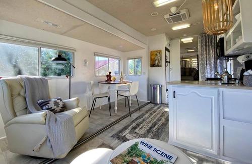 Medford House | 2 separate RV’s with queen-sized beds, dining area, and full kitchen.