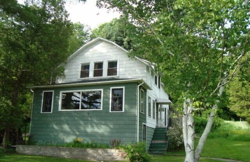 Onekama House | 2 story home across from beautiful Portage Lake.