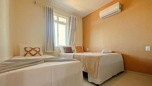 Porto das Dunas Apartment | 2 suítes temporada - VENTILADO E NASCENTE, condomínio tranquilo com PISCINA, CHURRASQUEIRA E PLAYGROUND I Cozinha completa, estacionamento coberto, home office I Ideal para FAMÍLIAS E CASAIS I Prox do BEACH PARQUE e PRAIA - Porto das Dunas - CE