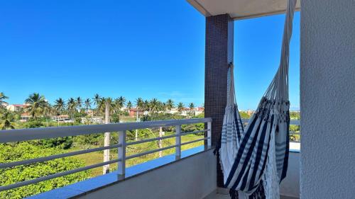 Porto das Dunas Apartment | 2 suítes temporada - VENTILADO E NASCENTE, condomínio tranquilo com PISCINA, CHURRASQUEIRA E PLAYGROUND I Cozinha completa, estacionamento coberto, home office I Ideal para FAMÍLIAS E CASAIS I Prox do BEACH PARQUE e PRAIA - Porto das Dunas - CE