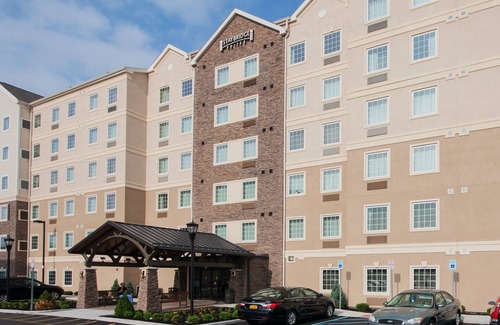 Amherst Apartment | 20 Minutes from Niagara Falls! | Free Breakfast, Pool & Hot Tub.