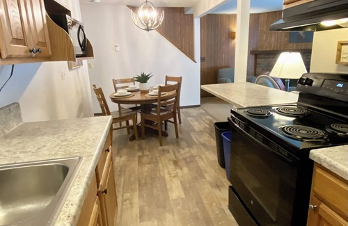 Eagle River Condo | 2Bed, 2Bath on Eagle River Chain of Lakes, Boat Slip Included