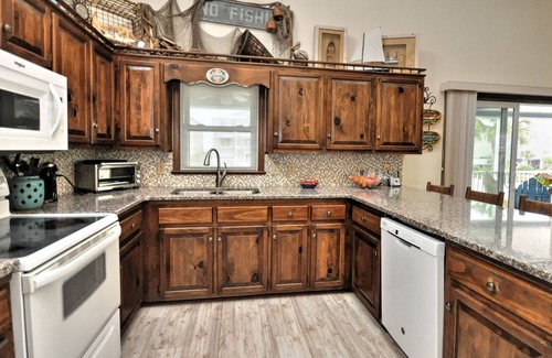 Sunset Beach House | 2nd Row House - 2 min walk to beach, oversized screened porch and ready for fun