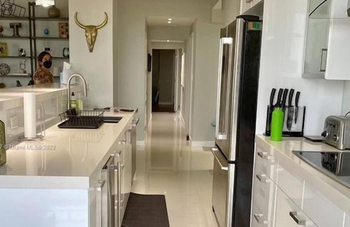 Surfside Condo | 3 Bedroom Condo 440171 by Houzlet
