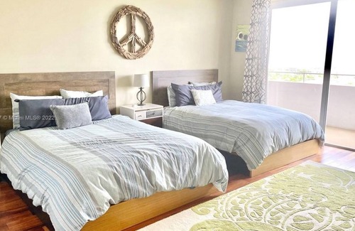 Surfside Condo | 3 Bedroom Condo 440171 by Houzlet