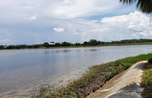 Salem House | 3-bedroom RV in charming Dark Island Perry Fl with AC, WiFi. Enjoy a cozy stay