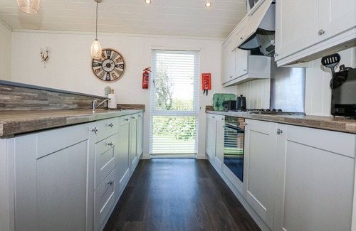 Rhyd-y-clafdy Cottage | 32 SANCTUARY LODGE, pet friendly, with pool in Y Ffor
