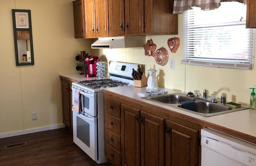 Grove Cottage | 3BR/2BA Lake Front Property For Rent With Lake Dock, RV & Boat Charging Stations