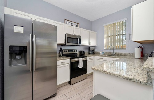 Regal Palms House | 4 BD + Lazy River + Resort + Arcade! + Tiki Bar