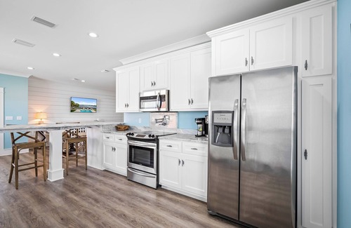 Pass Chateau Harbor House | 4 Bedroom Bay Front Home with Private Pool
