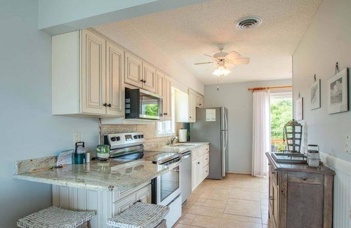 Sea Acres House | 4210- Changes in Latitude, Georgetown Sands condo, outdoor shower, with community pool and tennis