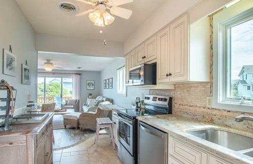 Sea Acres House | 4210- Changes in Latitude, Georgetown Sands condo, outdoor shower, with community pool and tennis