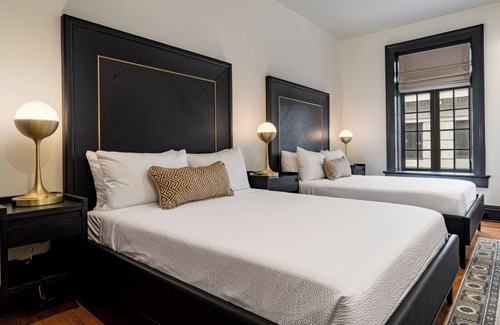 Central Business District Hotel | 4BR 2-Story Historic Space Steps from French Quarter | The Mayfair