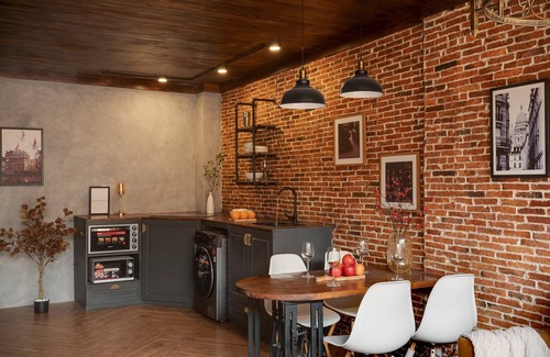Downtown Ho Chi Minh City House | 4BR Industrial Gem with Rooftop Garden by Bến Thành