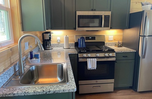Charlevoix Cabin | 5 minutes to town, New Cabin-2/4 adults or family up to 4 kids. Beach 2 miles.