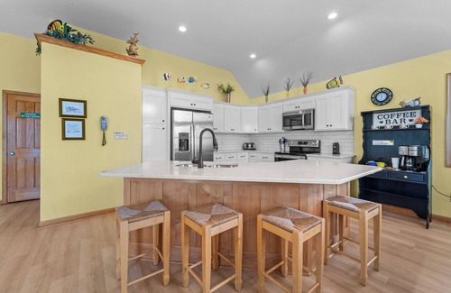 Colington House | 5120- Just Chillin, a spacious 4-bed, 3.5-bath home in Kill Devil Hills, perfect for up to 8.