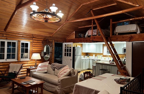 West Greenwich Cabin | 60's Heirloom Log Cabin on the water, Book Fall and watch the leaves turn 🍁