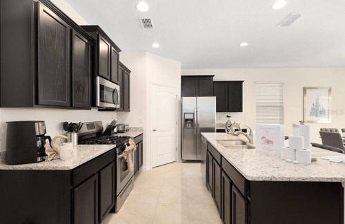 Loughman Resort | 6BR Home with Pool & Games in Resort near Disney