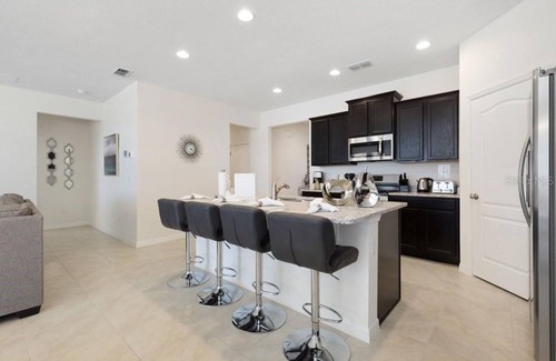 Loughman Resort | 6BR Home with Pool & Games in Resort near Disney
