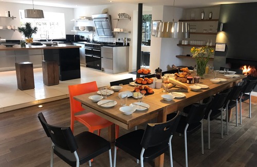 Stoke Ferry House | 7 Storey Listed Windmill, dog friendly with outdoor pool & bbq
