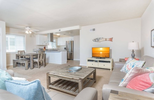 West Newport Condo | 7BR Retreat with Ocean View Balcony & Patio, Just Steps from the Sand!